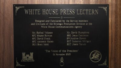 Plaque on the White House press lectern in the James S. Brady Press Briefing Room