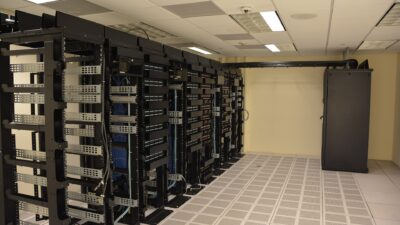 Rows of server racks inside a data center