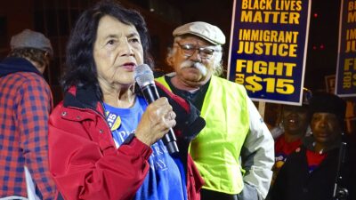 Dolores Huerta speaking at an event
