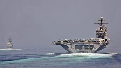 U.S. Navy ships transiting the Strait of Hormuz