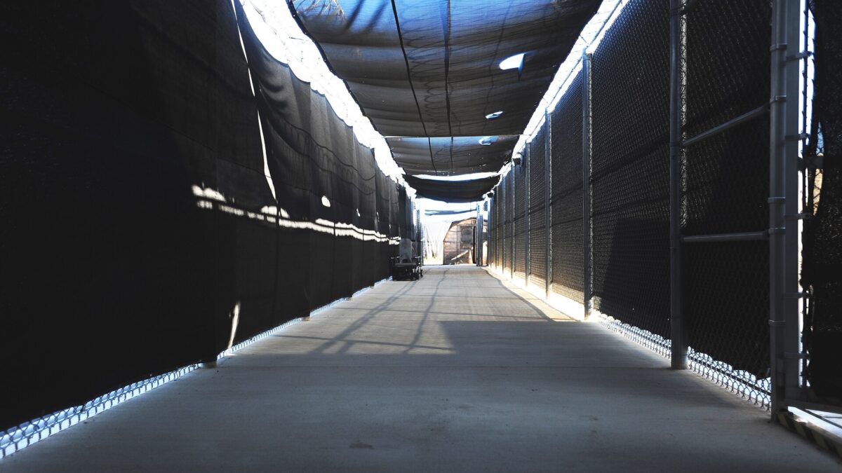 A fenced and screened walkway at the Expeditionary Legal Complex, the military commissions court site at Guantanamo Bay, Cuba