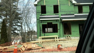 New home under construction with wood framing