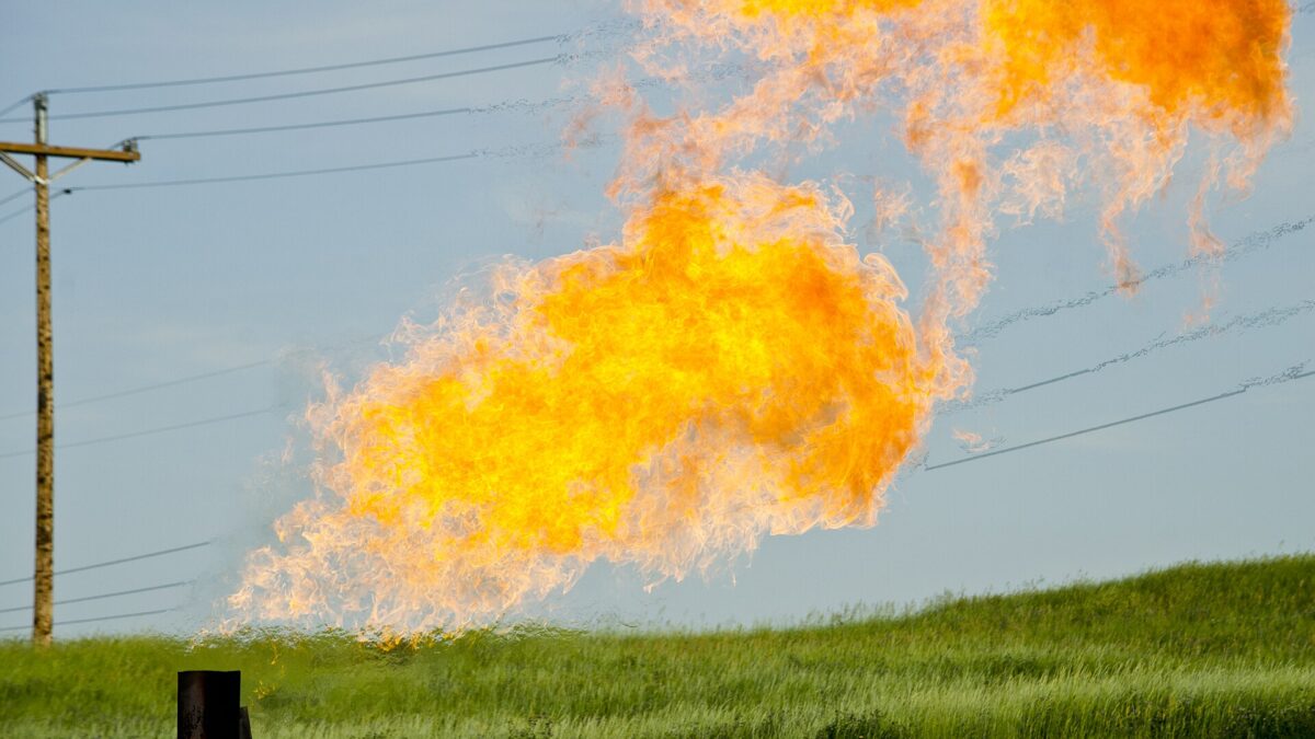 A natural gas flare burning at an oil well site in North Dakota