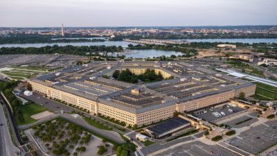 Aerial view of the Pentagon in Arlington, Virginia, with Washington in the background