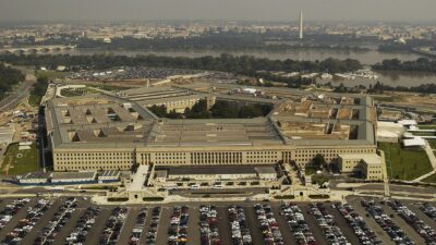 Aerial view of the Pentagon in Arlington, Virginia, with the Potomac River and Washington Monument behind it