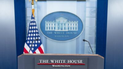 Empty podium in the James S. Brady Press Briefing Room at the White House