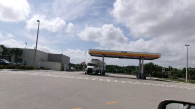 Diesel pumps under a canopy at a highway service plaza in Florida