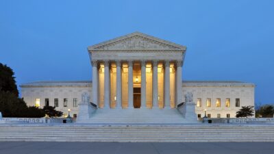 The U.S. Supreme Court building in Washington at dusk