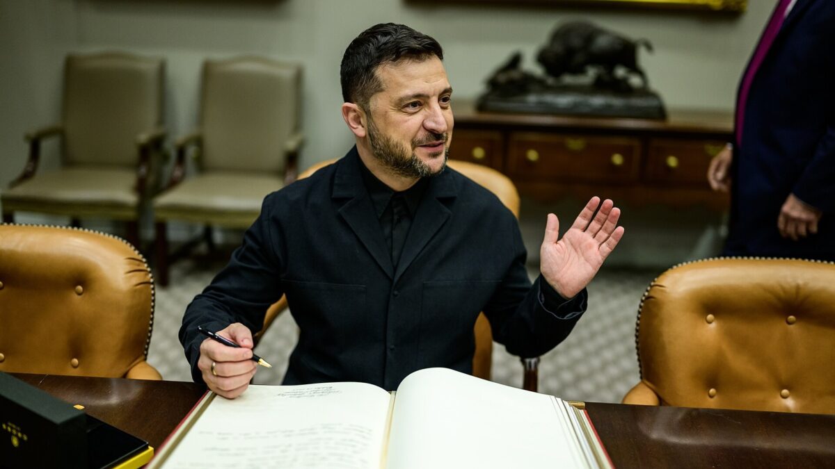 Ukrainian President Volodymyr Zelenskyy gestures while signing a guest book in the White House Cabinet Room (file photo)