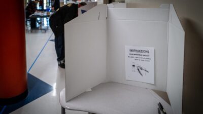 Voters casting ballots at a polling place in Des Moines, Iowa, on Election Day 2020