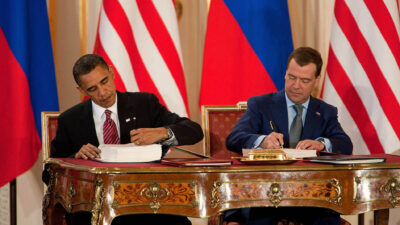 Presidents Barack Obama and Dmitry Medvedev signing the New START treaty in Prague in 2010