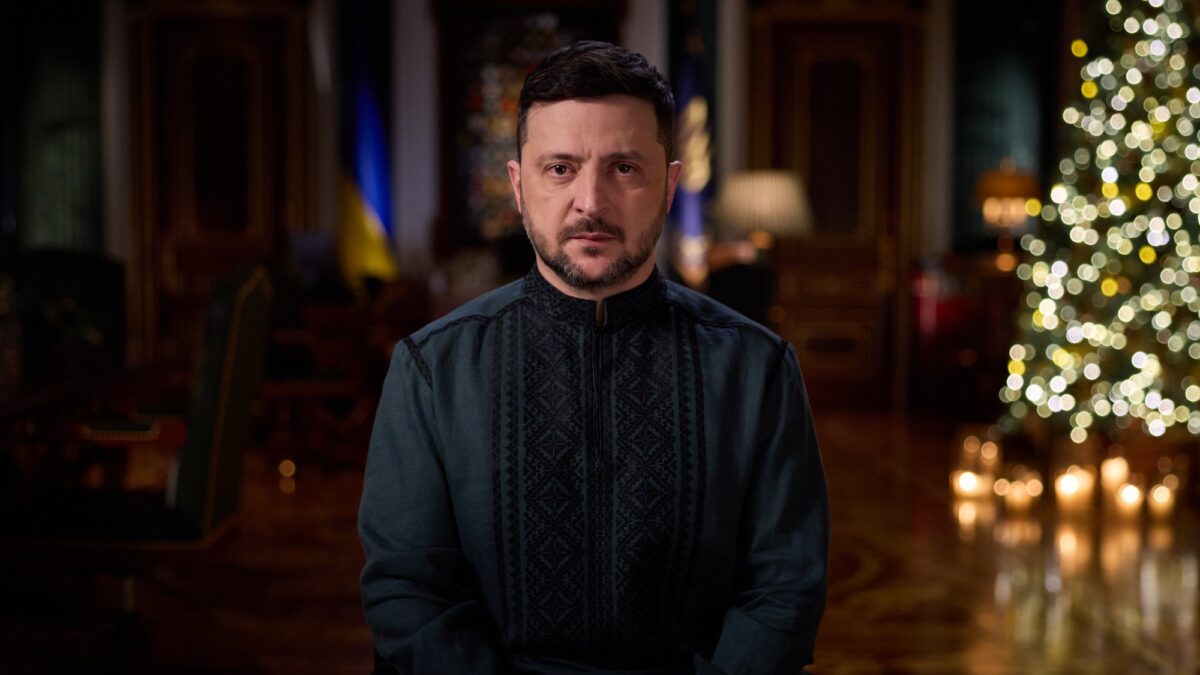 Ukrainian President Volodymyr Zelenskyy speaking at a podium